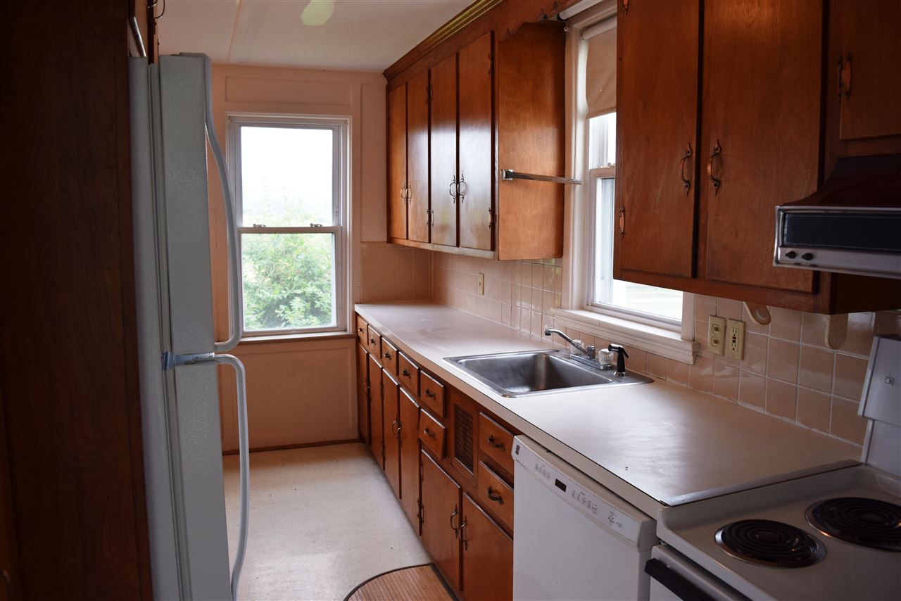 1800 Duke Road Waynesboro, VA 22980 - Photo 10 of 41 a kitchen with a sink stove and cabinets