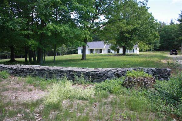945 Old Dana Road Barre, MA 01005 - Photo 1 of 19 a garden view with a fountain