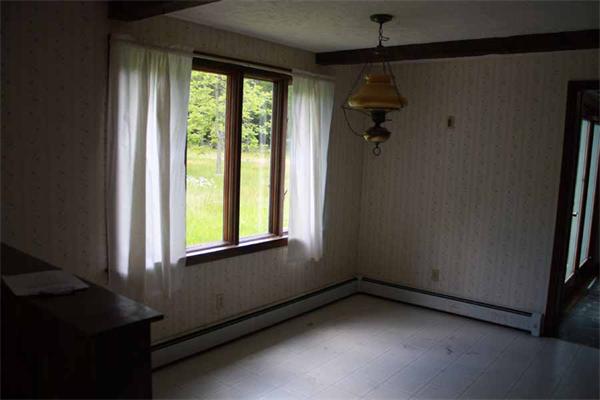 945 Old Dana Road Barre, MA 01005 - Photo 8 of 19 a view of an empty room and a window