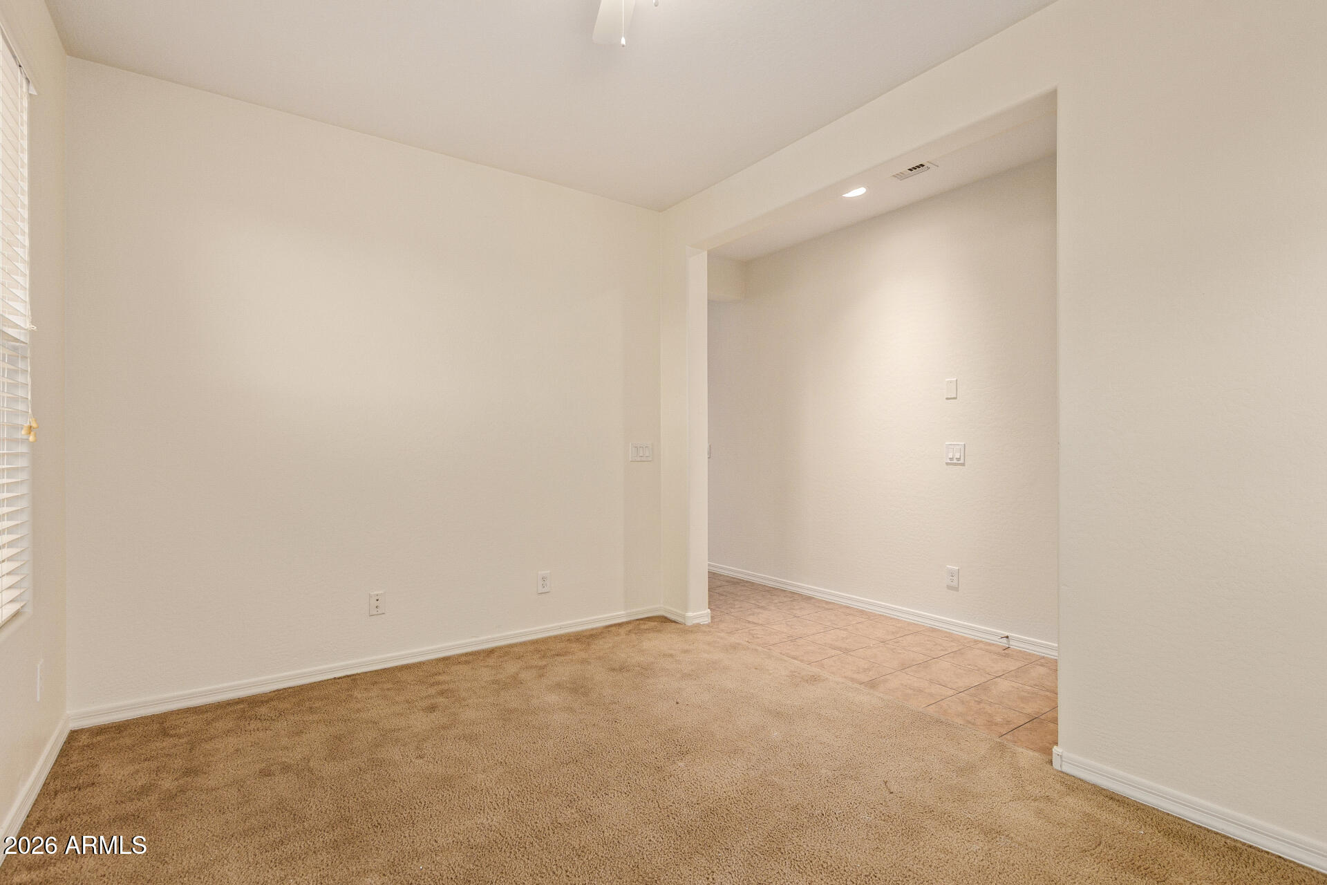 41334 West Rio Bravo Drive Maricopa, AZ 85138 - Photo 8 of 43 a view of an empty room