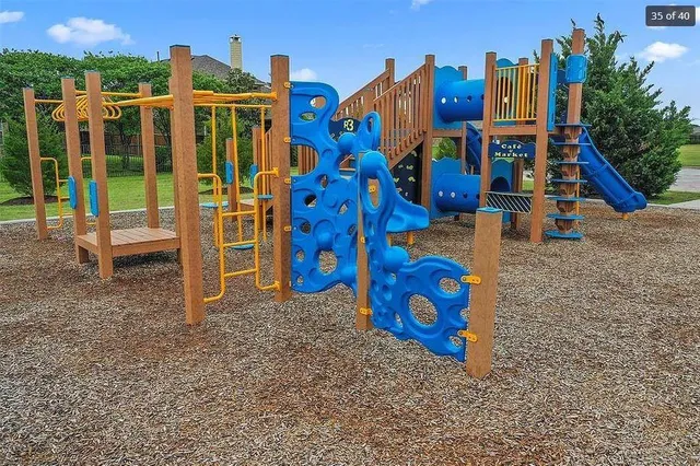 a view of a lake with a yard