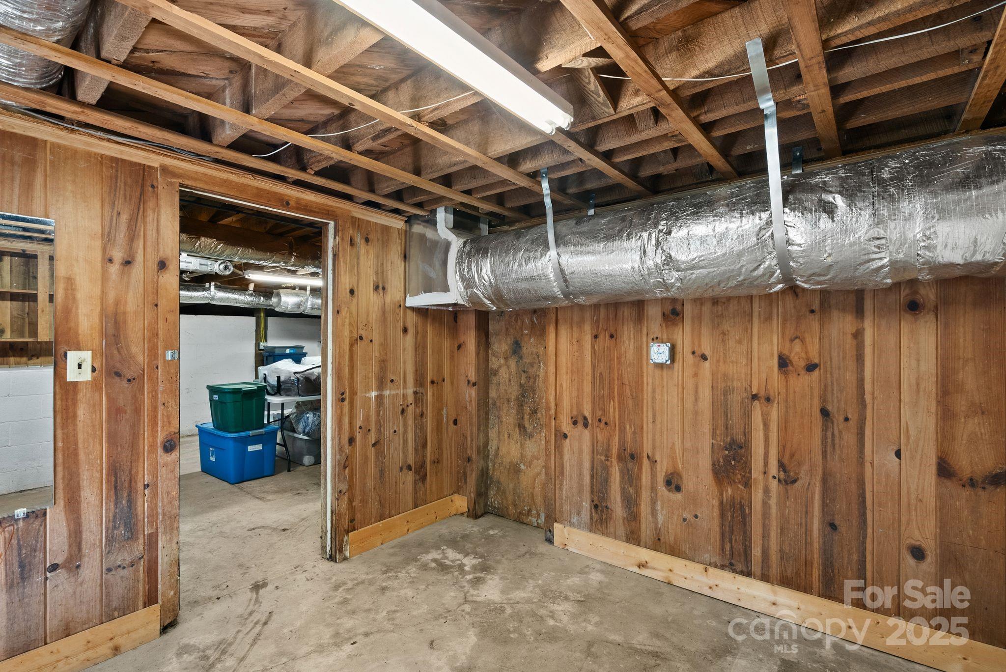 1215 Upper Brush Creek Road Fairview, NC 28730 - Photo 27 of 41 a view of a room with wooden walls