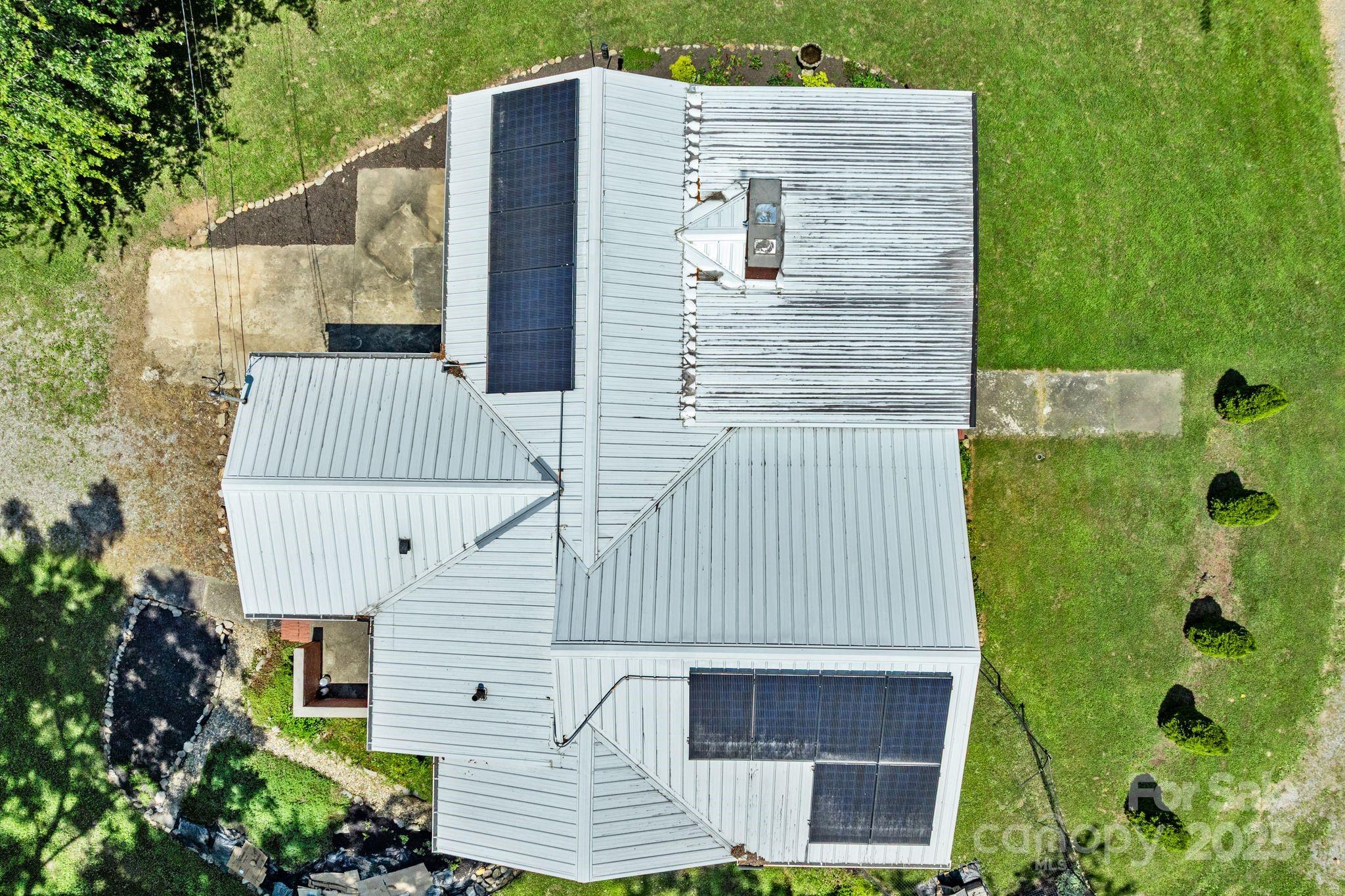 1215 Upper Brush Creek Road Fairview, NC 28730 - Photo 38 of 41 a view of a house with a backyard