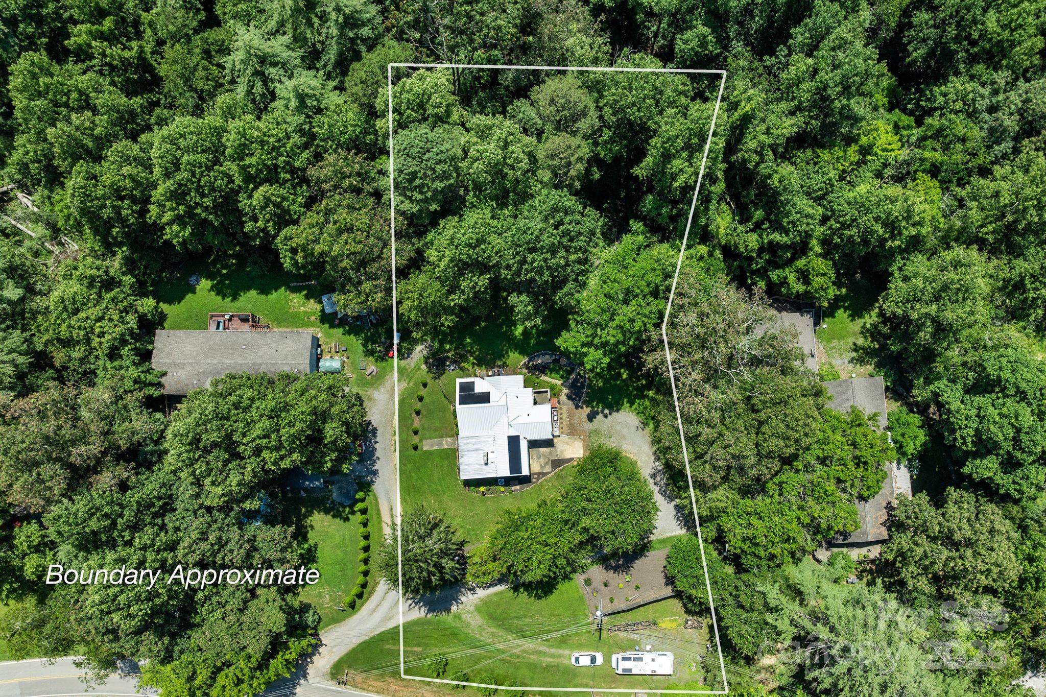 1215 Upper Brush Creek Road Fairview, NC 28730 - Photo 40 of 41 an aerial view of a house with a yard