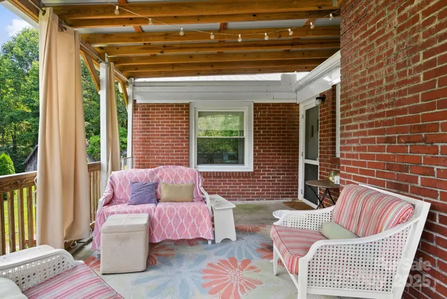 a outdoor living space with furniture and a window