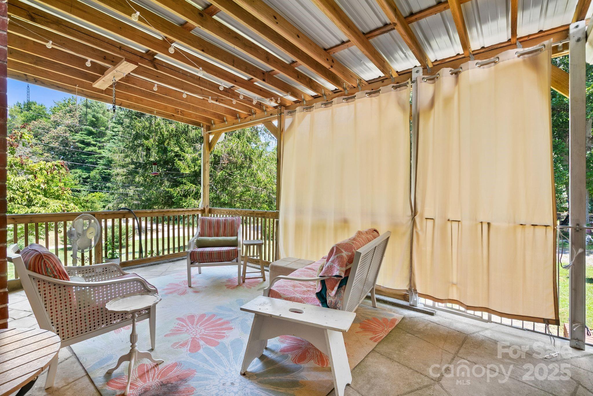 1215 Upper Brush Creek Road Fairview, NC 28730 - Photo 6 of 41 a outdoor space with furniture