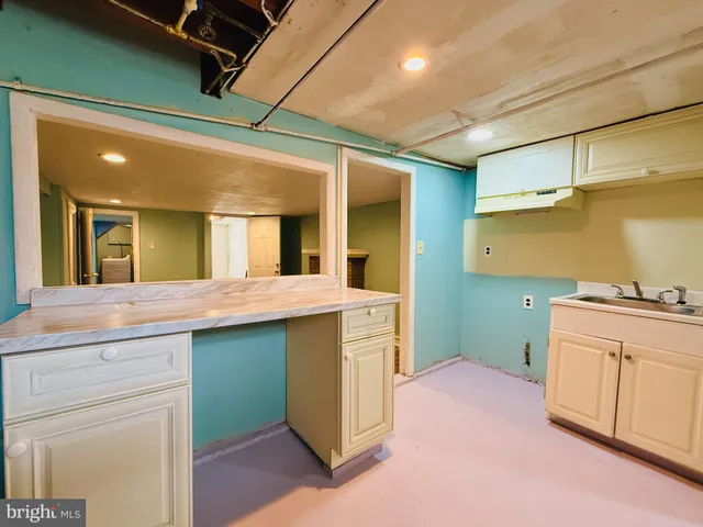 a bedroom with a bed and a walk in closet