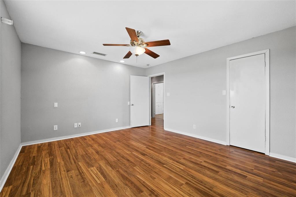 358 Wright Road Waxahachie, TX 75167 - Photo 32 of 38 a view of an empty room and wooden floor