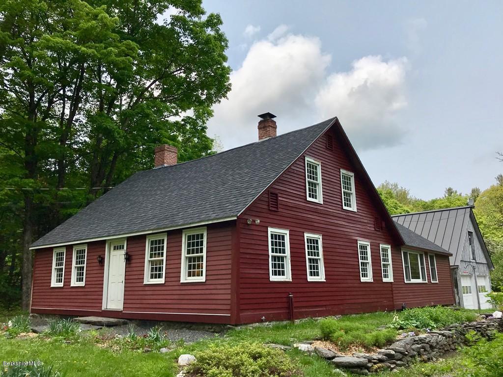 117 Colrain Stage Road Heath, MA 01346 - Photo 1 of 41 a front view of a house with a yard