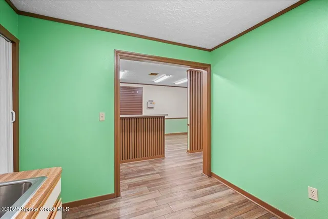 a kitchen with stainless steel appliances a refrigerator and a sink
