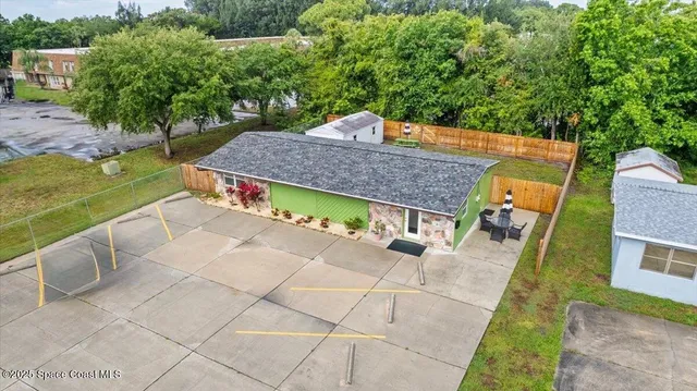 a bathroom with a shower and a sink