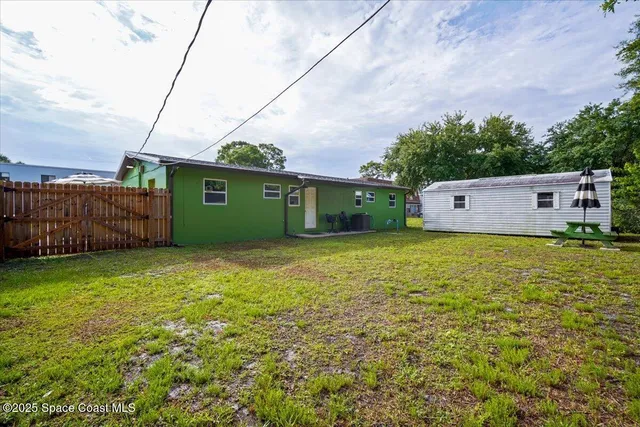 a room with furniture and a wooden floor