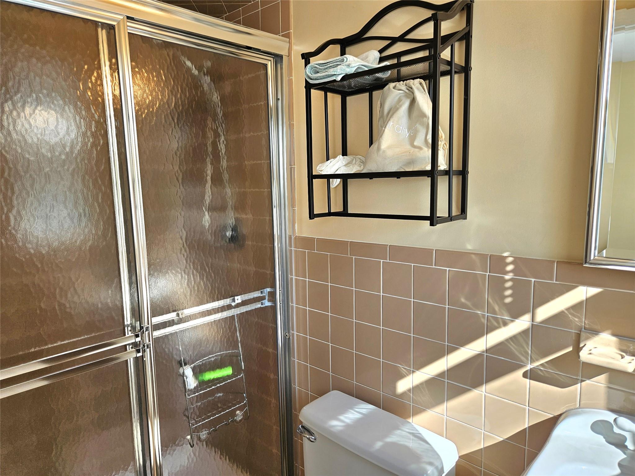 3650 Bay Shore Road Greenport, NY 11944 - Photo 29 of 30 a bathroom with a shower and a sink