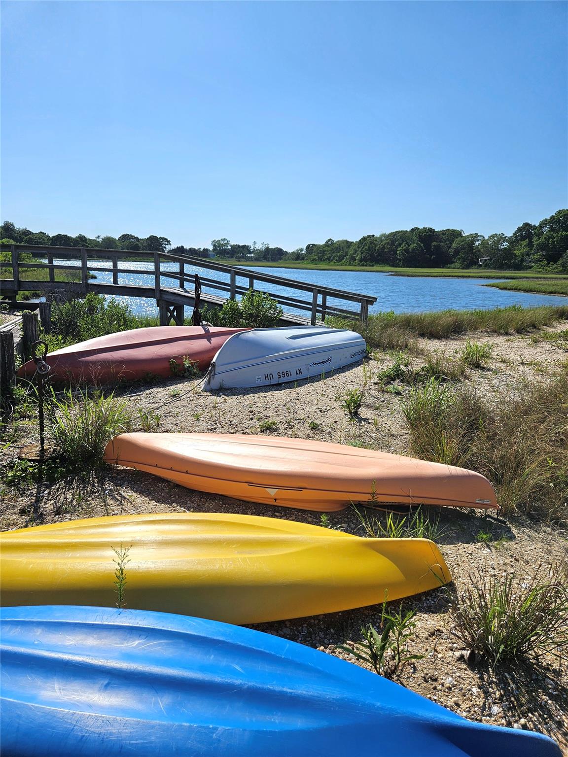3650 Bay Shore Road Greenport, NY 11944 - Photo 6 of 30 a view of swimming pool with outdoor seating and yard in back