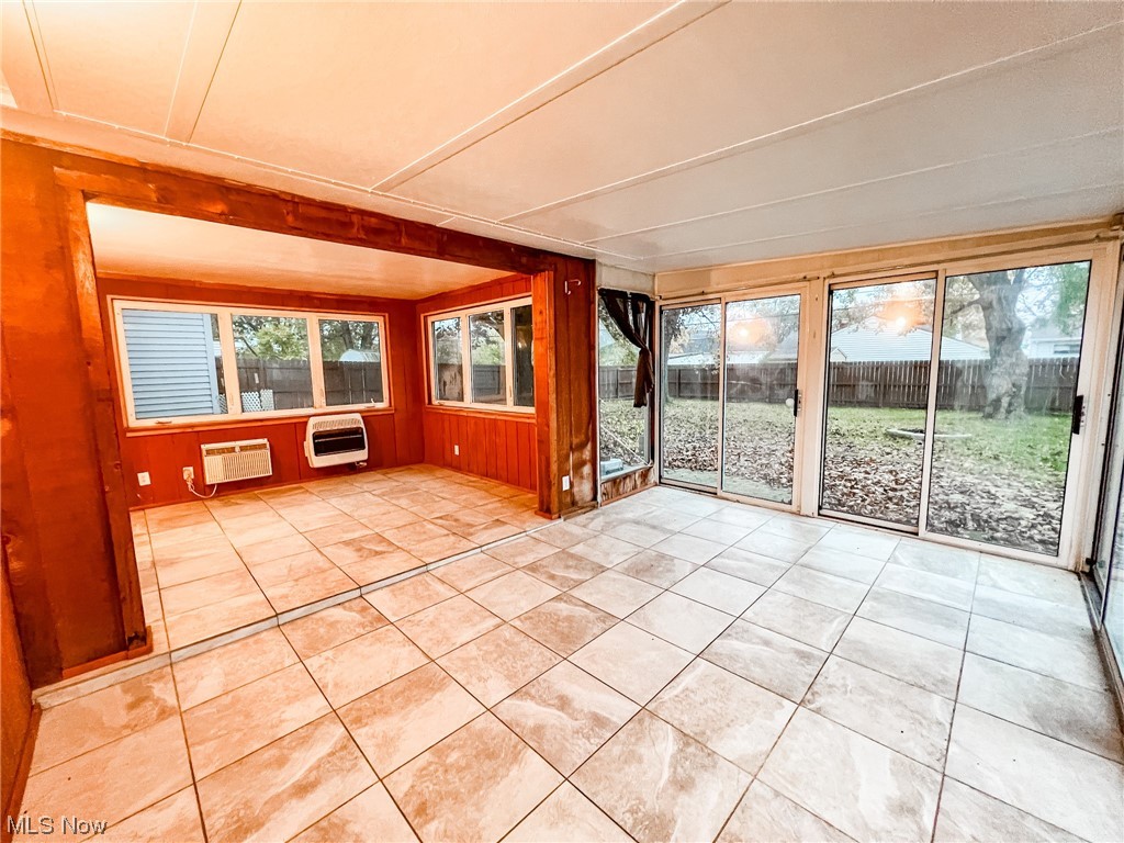 6830 Oakwood Road Parma Heights, OH 44130 - Photo 17 of 22 View of unfurnished sunroom