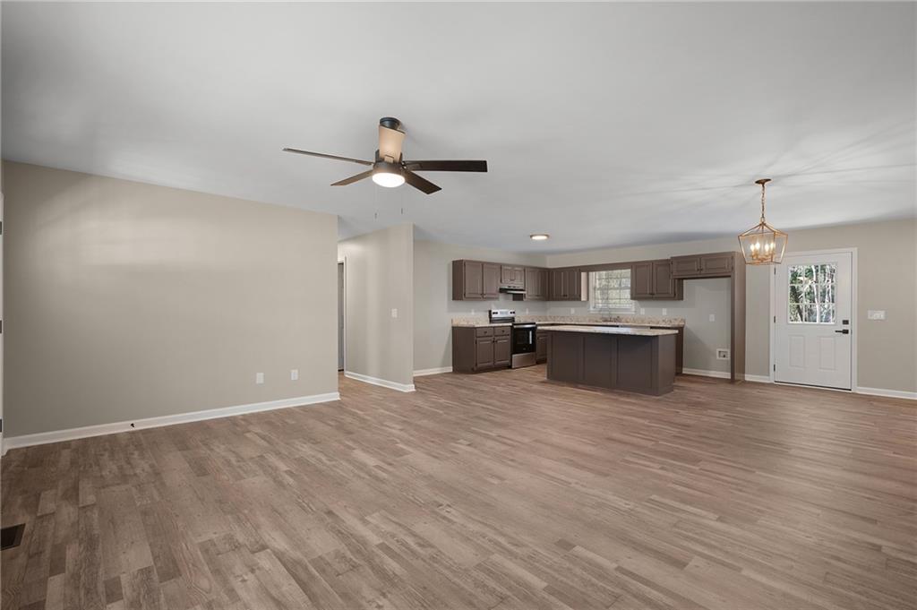 789 Buck Boulevard Southeast Calhoun, GA 30701 - Photo 2 of 14 a view of a kitchen with a sink and cabinet
