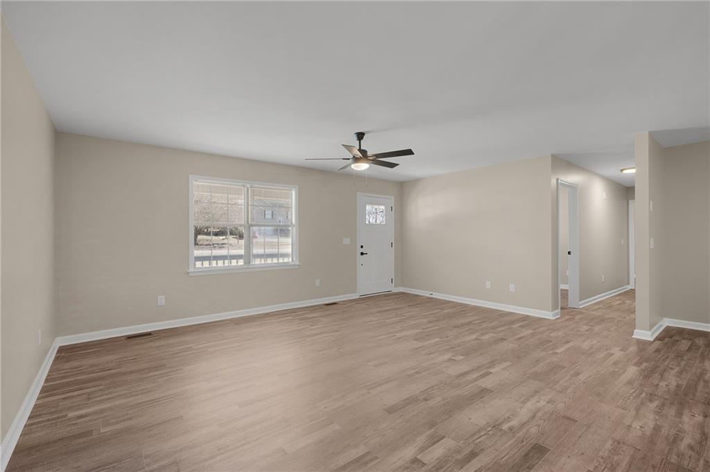 789 Buck Boulevard Southeast Calhoun, GA 30701 - Photo 6 of 14 a view of an empty room with a window
