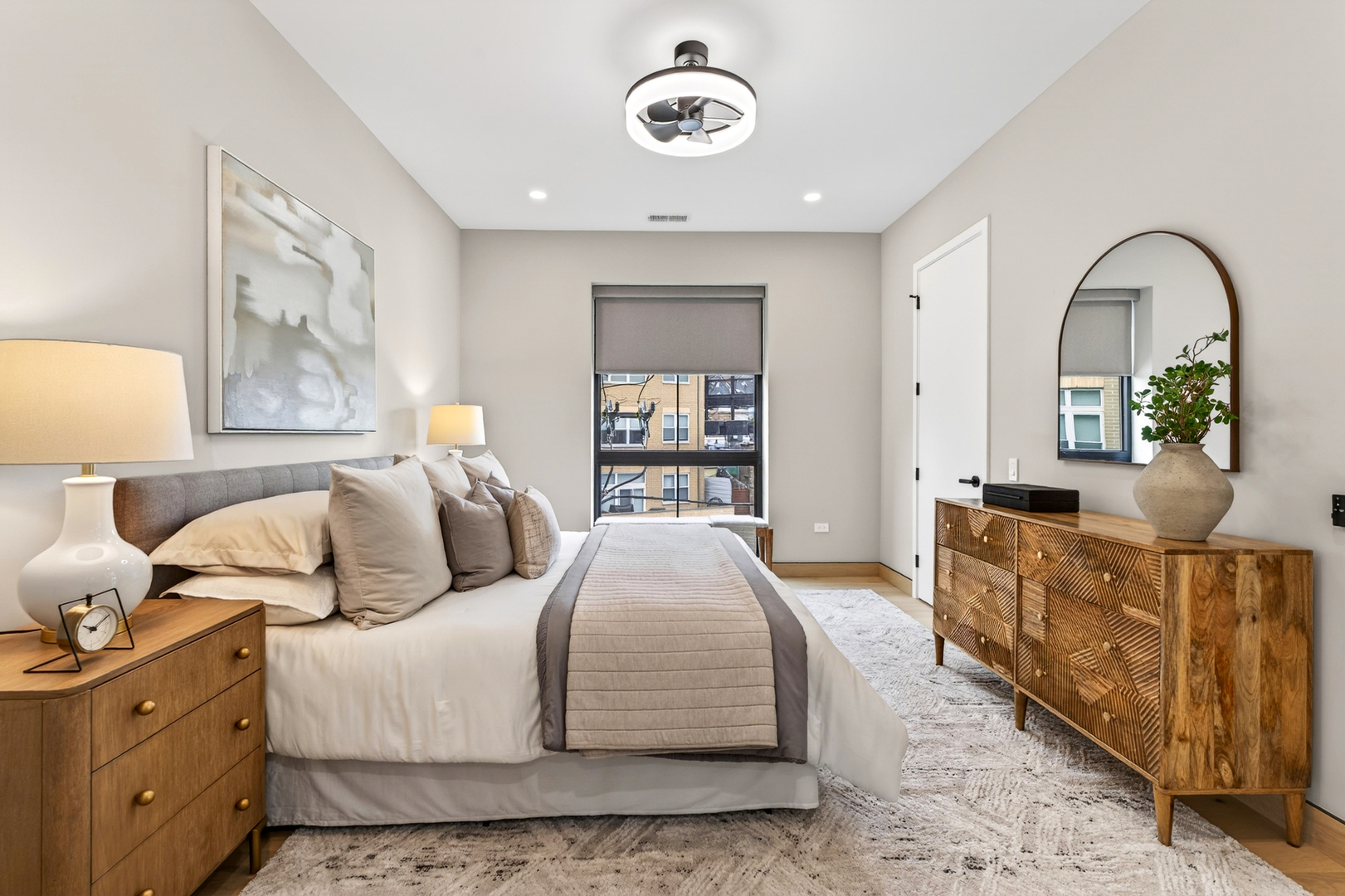 2024 West Irving Park Road, Unit 302 Chicago, IL 60618 - Photo 13 of 32 a bedroom with bed and window