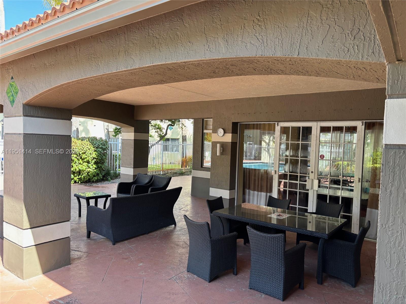 450 South Park Road, Unit 5104 Hollywood, FL 33021 - Photo 20 of 23 a dining room with furniture and window
