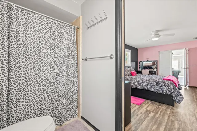 a view of a swimming pool with a patio