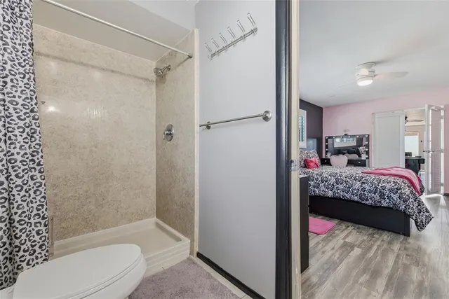 a view of a swimming pool with an outdoor seating