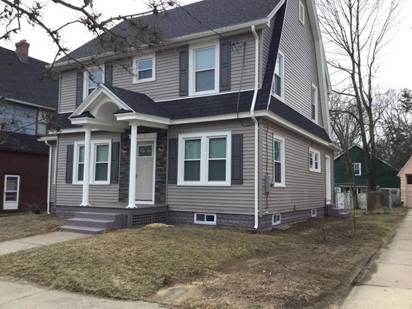 38 Fenwick Street Springfield, MA 01109 - Photo 3 of 28 a front view of a house with yard