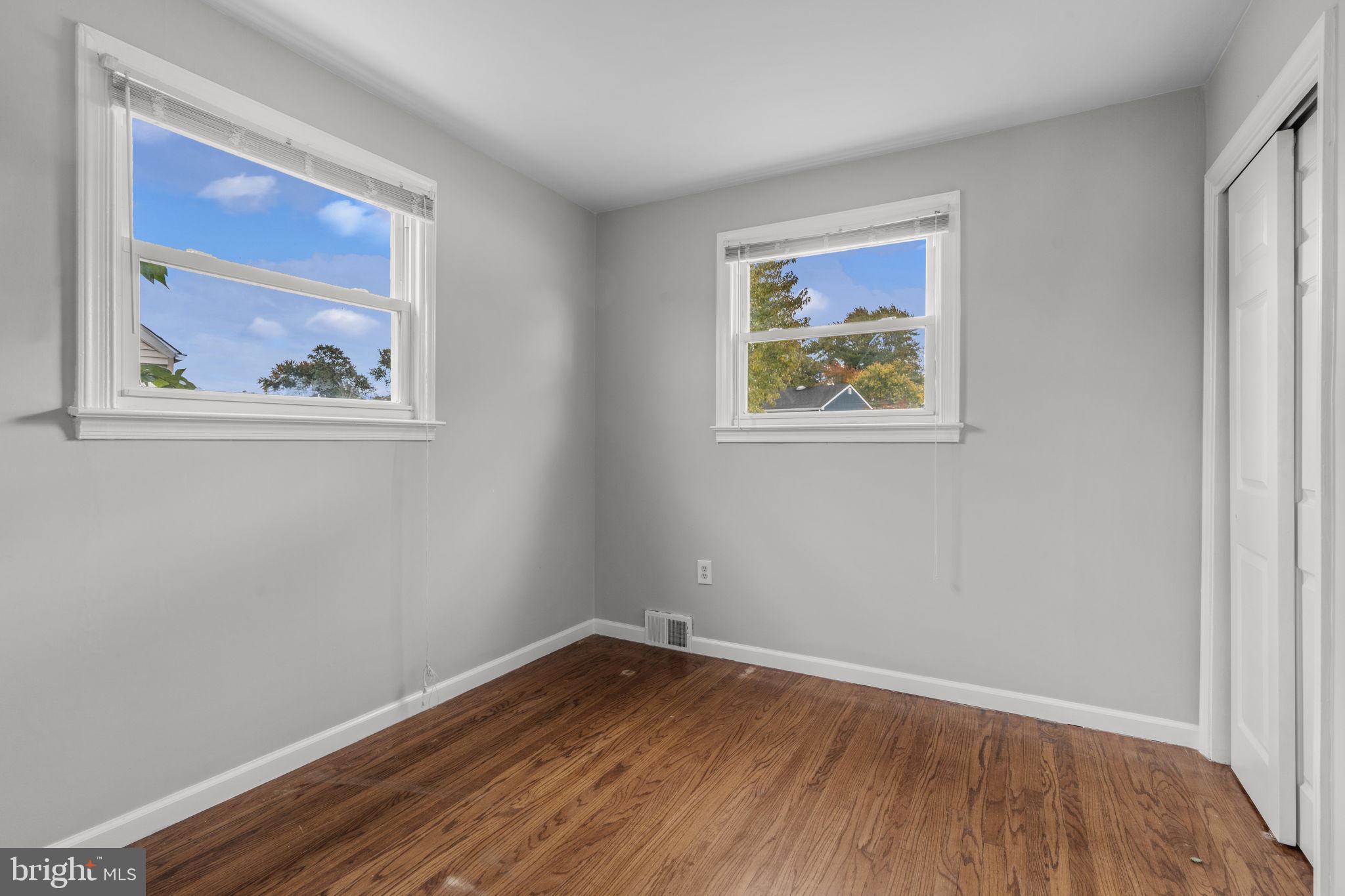 3 Cloverdale Road Blackwood, NJ 08012 - Photo 16 of 28 a view of a hallway with wooden floor and a workspace