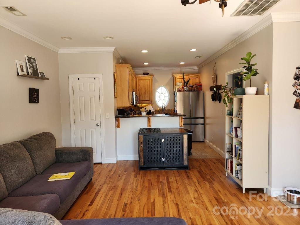 2326 Center Road Chester, SC 29706 - Photo 18 of 42 a living room with furniture and a wooden floor