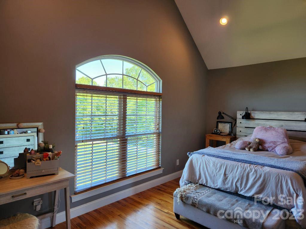 2326 Center Road Chester, SC 29706 - Photo 21 of 42 a bedroom with a bed and wooden floor