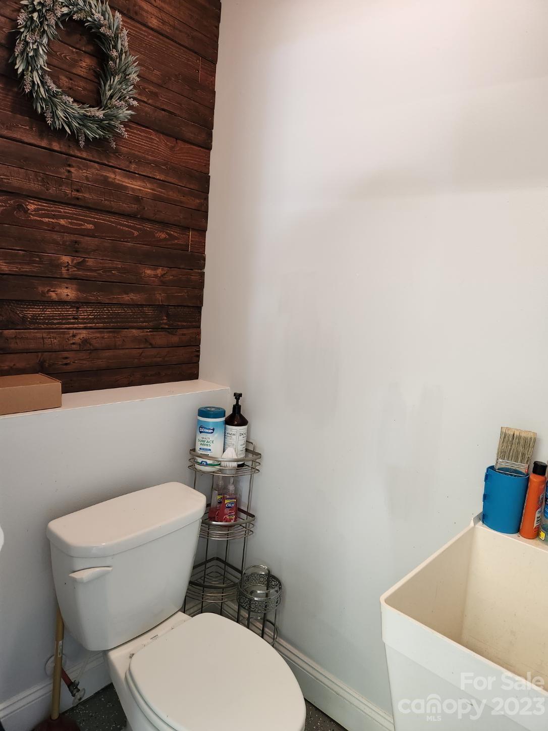 2326 Center Road Chester, SC 29706 - Photo 23 of 42 a white toilet sitting next to a white wall