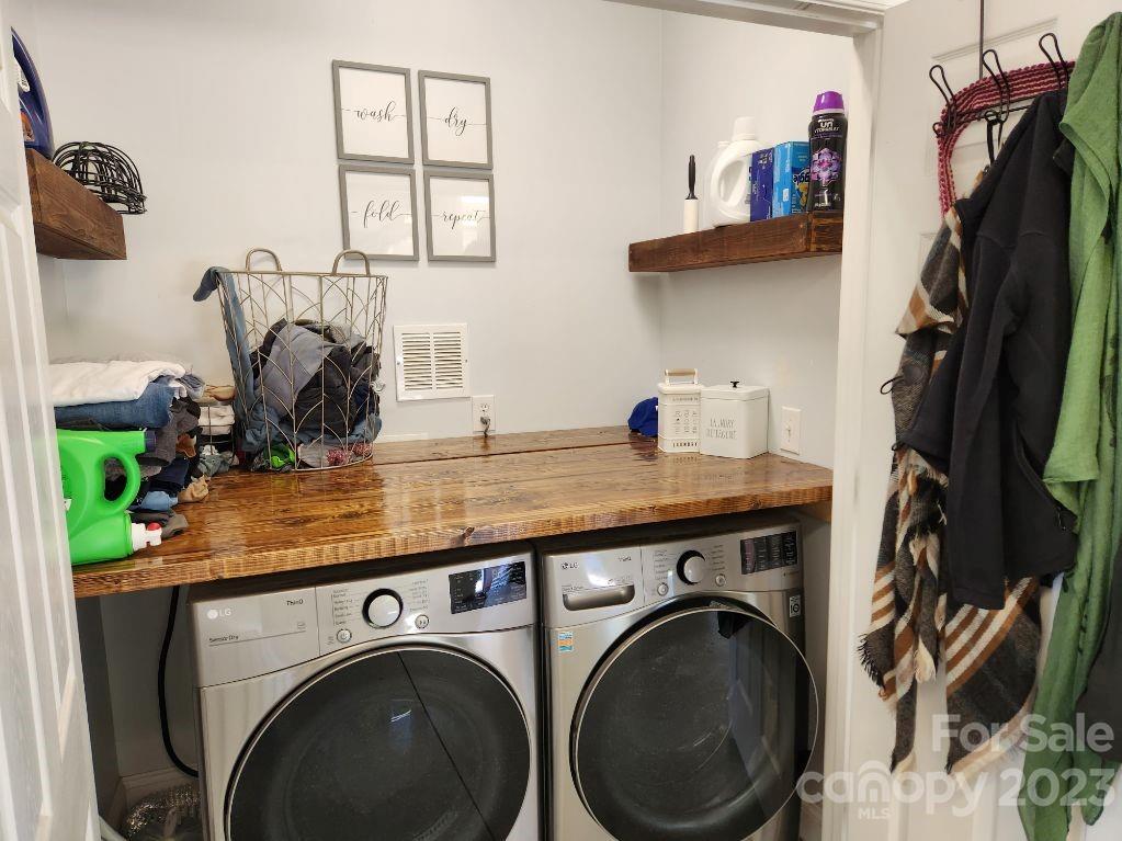 2326 Center Road Chester, SC 29706 - Photo 31 of 42 a view of storage and utility room with a washer dryer
