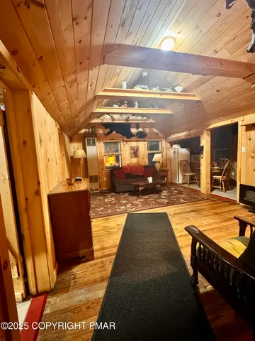 a view of a hall with couch