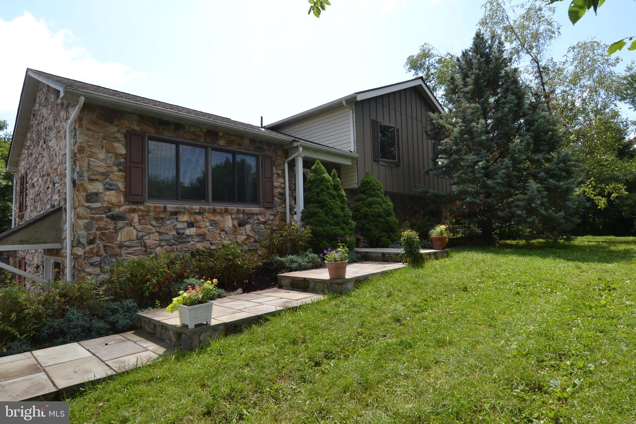 329 Isabella Road Elverson, PA 19520 - Photo 13 of 73 Front stone and hardie board exterior