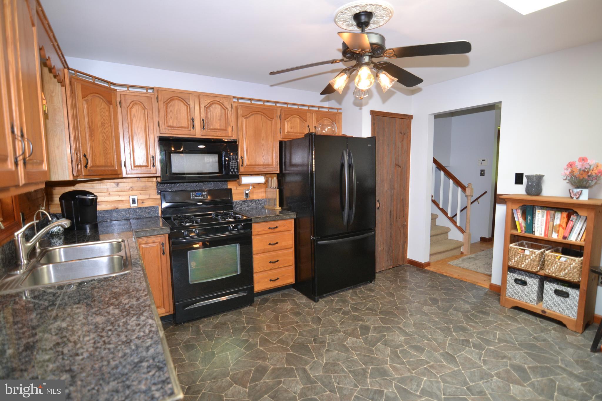 329 Isabella Road Elverson, PA 19520 - Photo 16 of 73 Granite tile counter tops