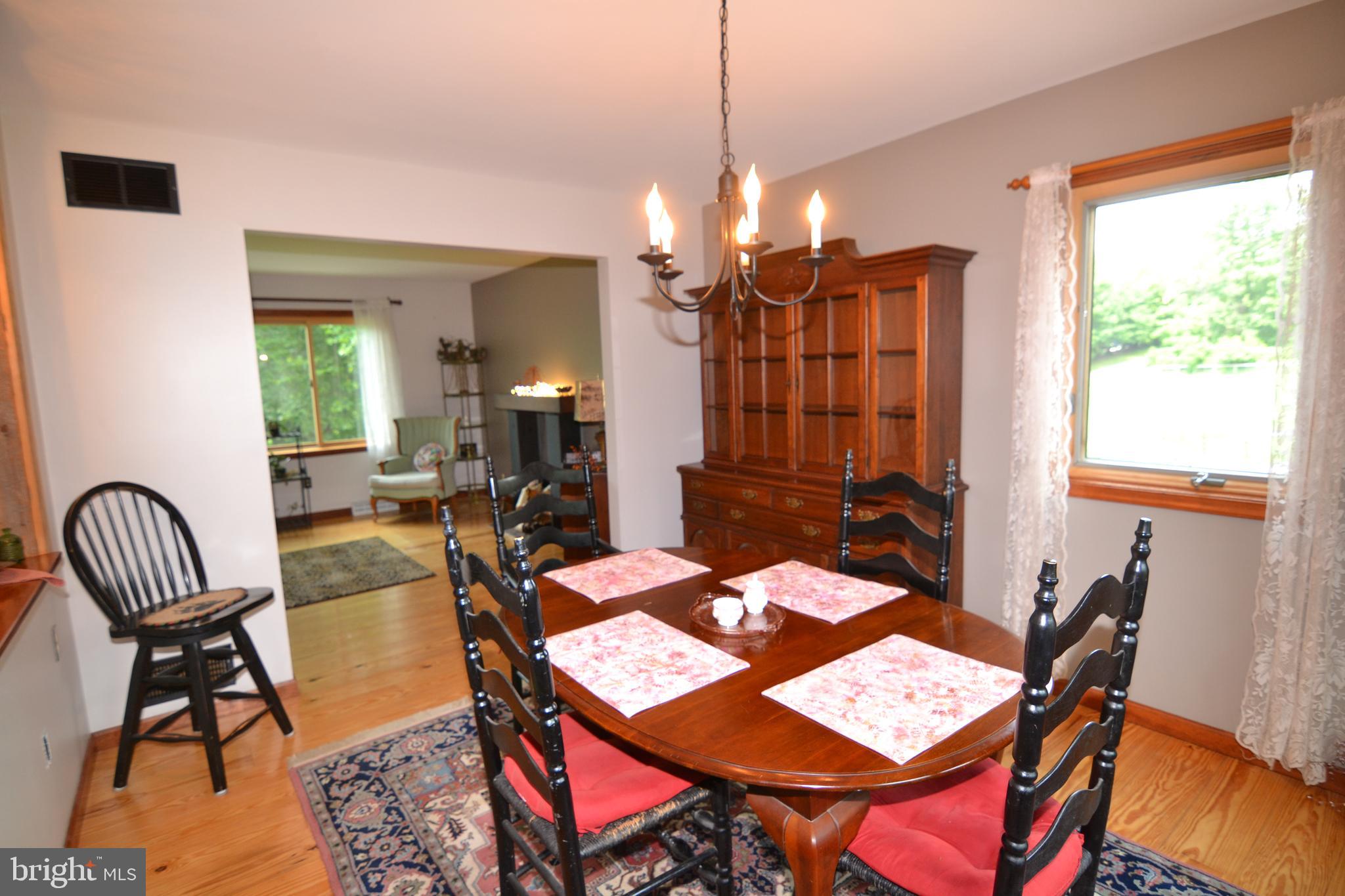 329 Isabella Road Elverson, PA 19520 - Photo 19 of 73 Formal dining room with hardwood flooring