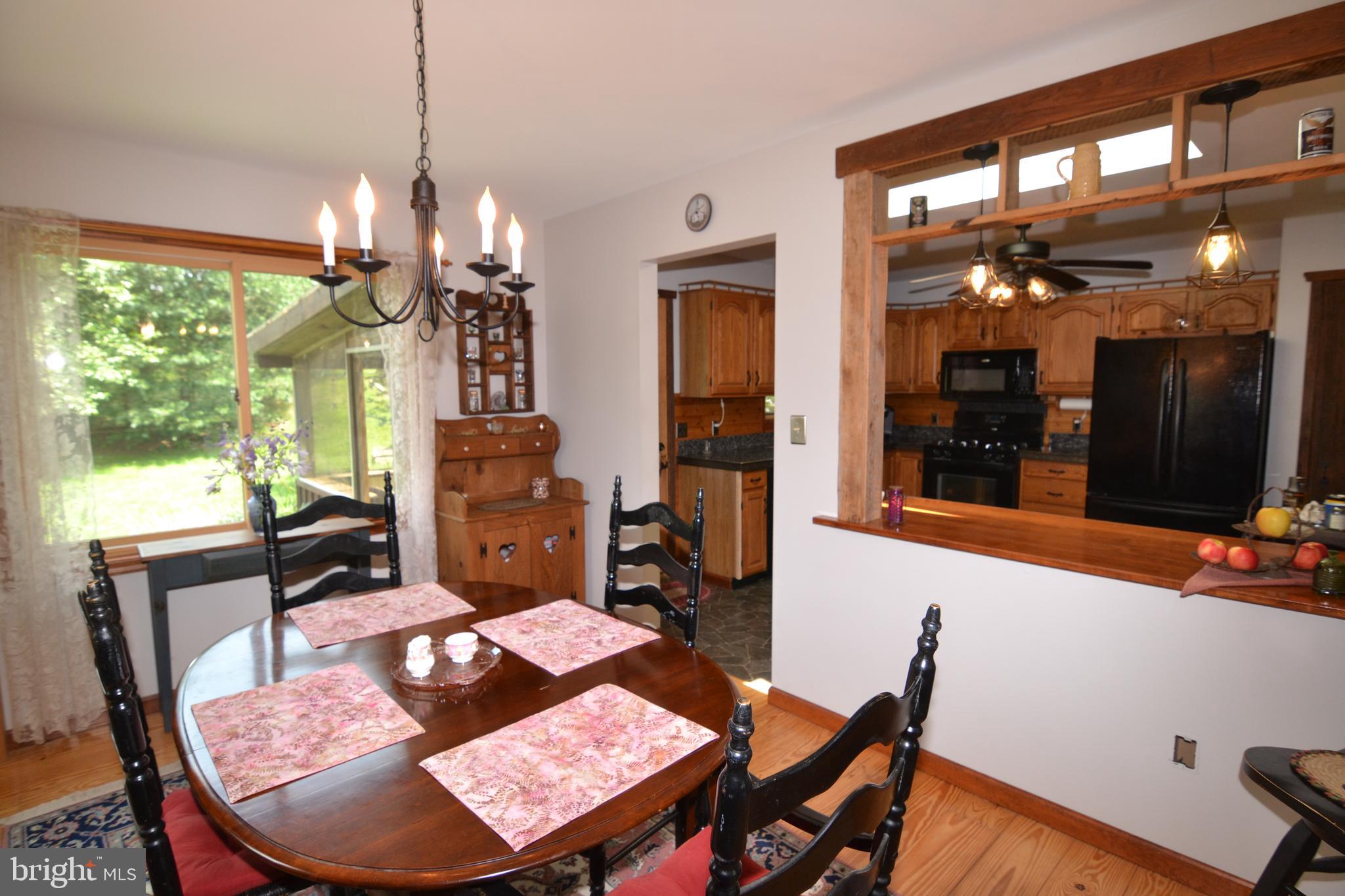 329 Isabella Road Elverson, PA 19520 - Photo 21 of 73 Dining Room with large Andersen slider window