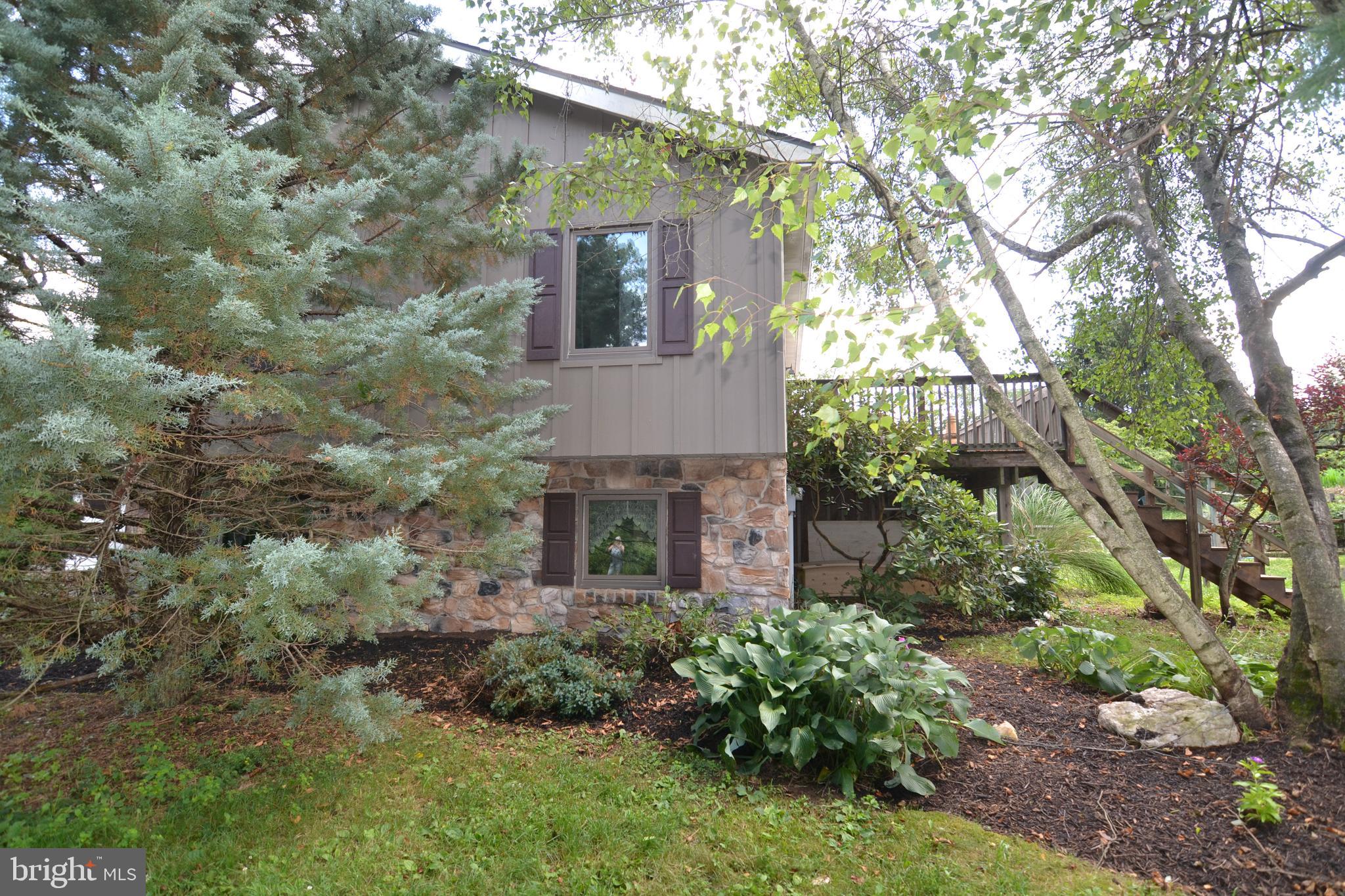 329 Isabella Road Elverson, PA 19520 - Photo 66 of 73 Front of home with gardens
