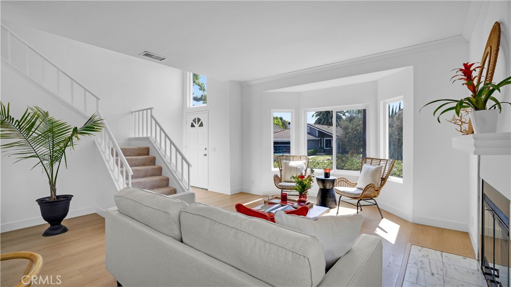 336 Fallingstar Irvine, CA 92614 - Photo 10 of 73 a living room with furniture and a potted plant