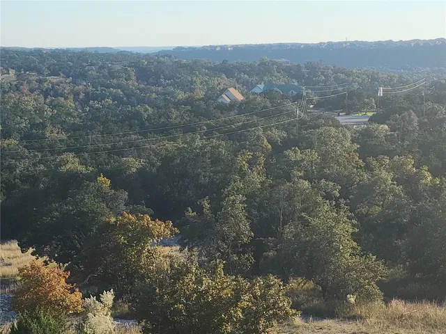 a view of mountain view with trees