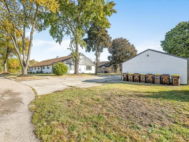 a view of big yard with large tree