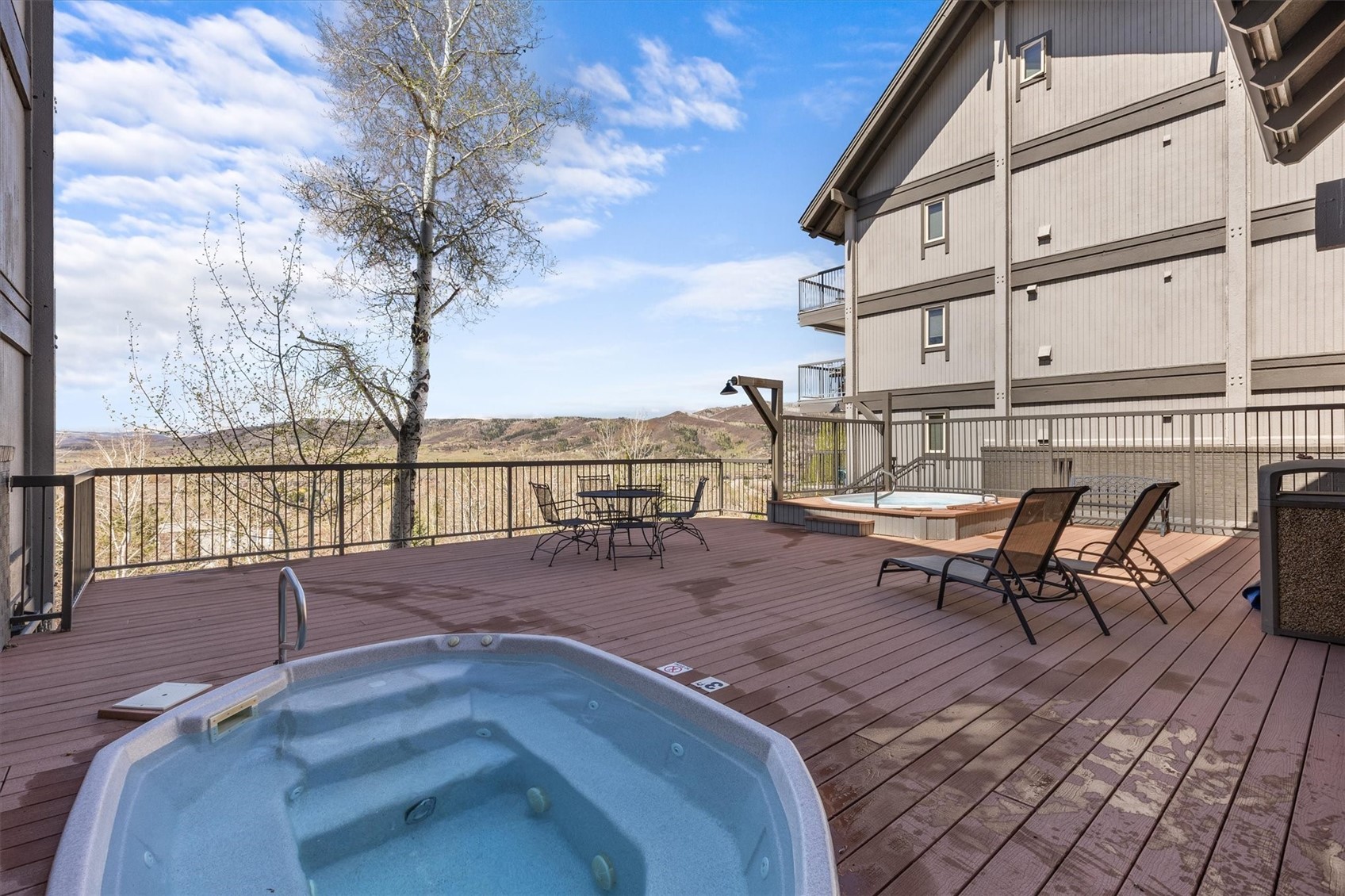 2602 Longthong Road, Unit 107 Steamboat Springs, CO 80487 - Photo 28 of 32 a view of a terrace with seating area