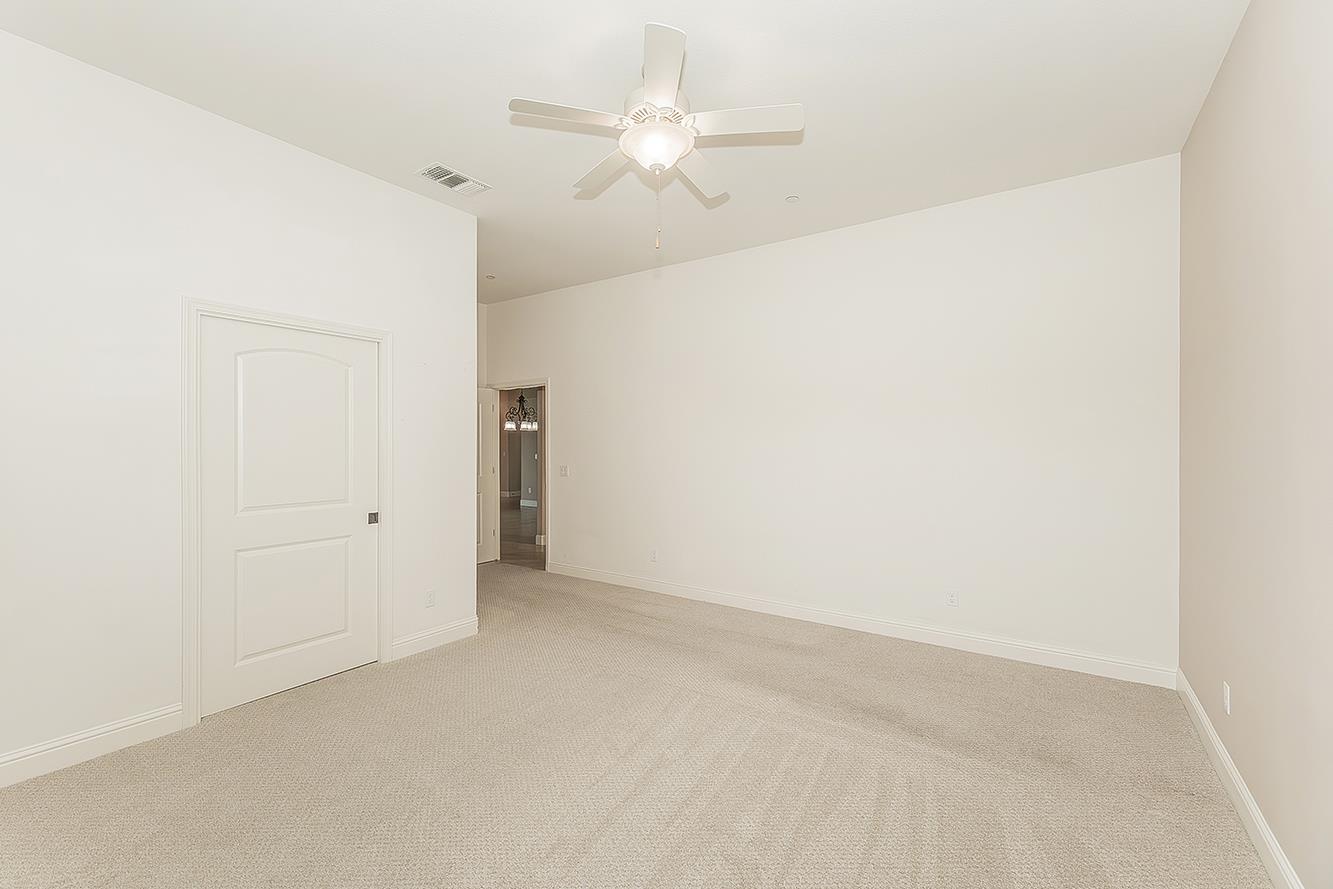 2047 South Church Avenue Reedley, CA 93654 - Photo 15 of 39 an empty room with fan and entrance