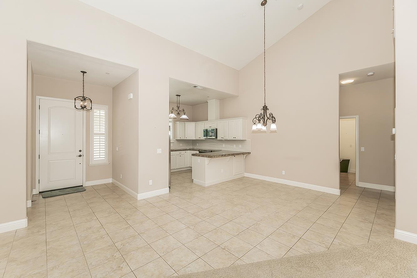 2047 South Church Avenue Reedley, CA 93654 - Photo 8 of 39 a view of a kitchen with a sink and cabinets