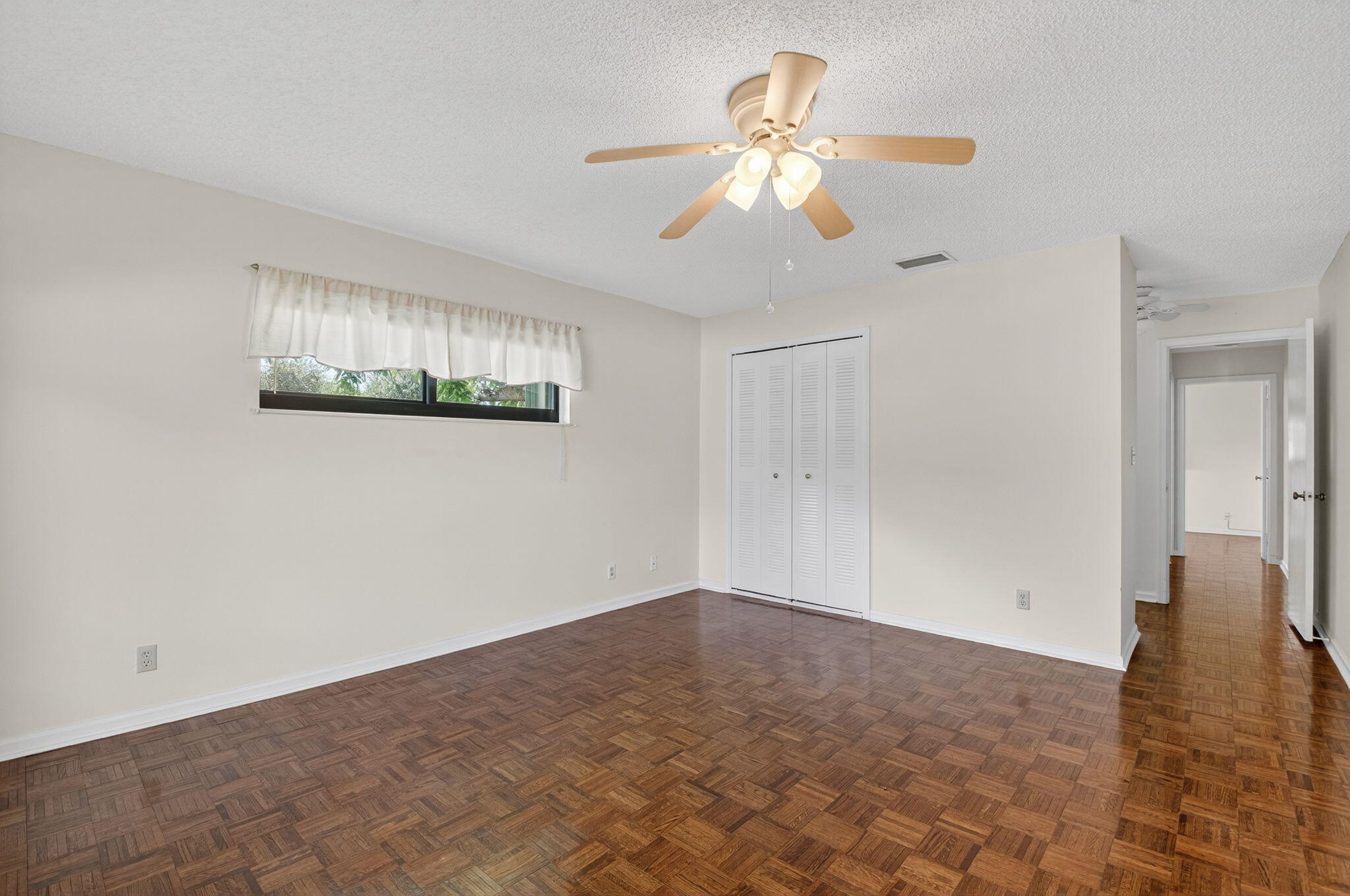 9855 Loquat Tree Run, Unit A Boynton Beach, FL 33436 - Photo 20 of 52 Primary Bedroom
