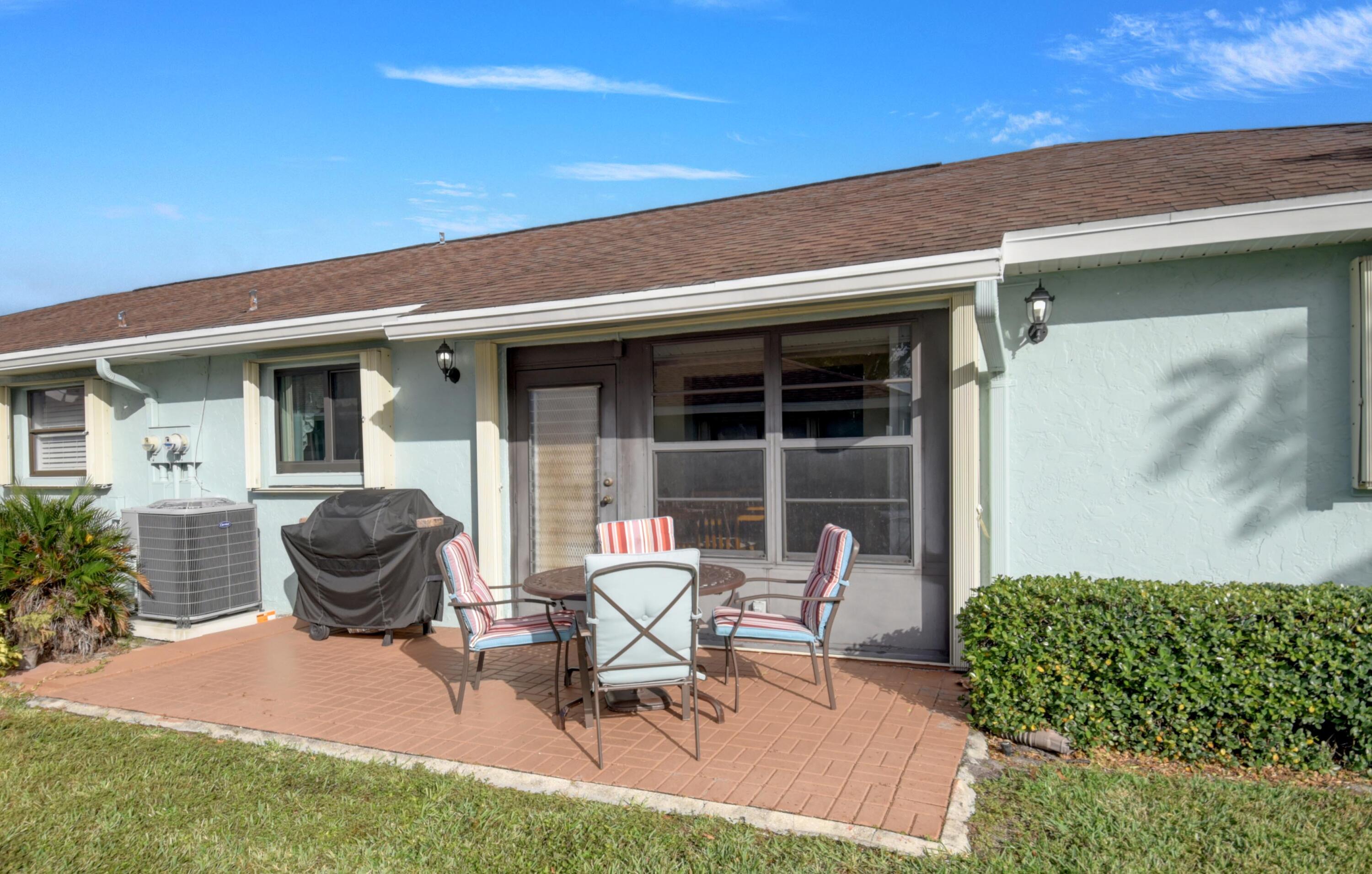 9855 Loquat Tree Run, Unit A Boynton Beach, FL 33436 - Photo 32 of 52 Back Exterior