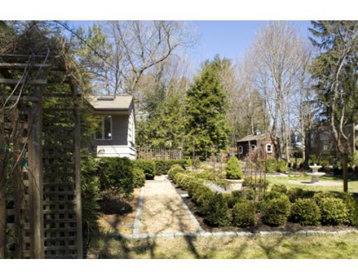 250 Ridgeway Road Weston, MA 02493 - Photo 6 of 20 a view of a house with a yard