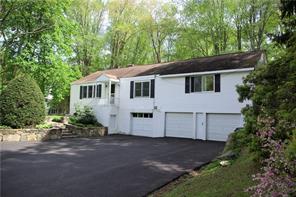 301 Pound Ridge Road Bedford, NY 10506 - Photo 1 of 1 a view of a house with a yard
