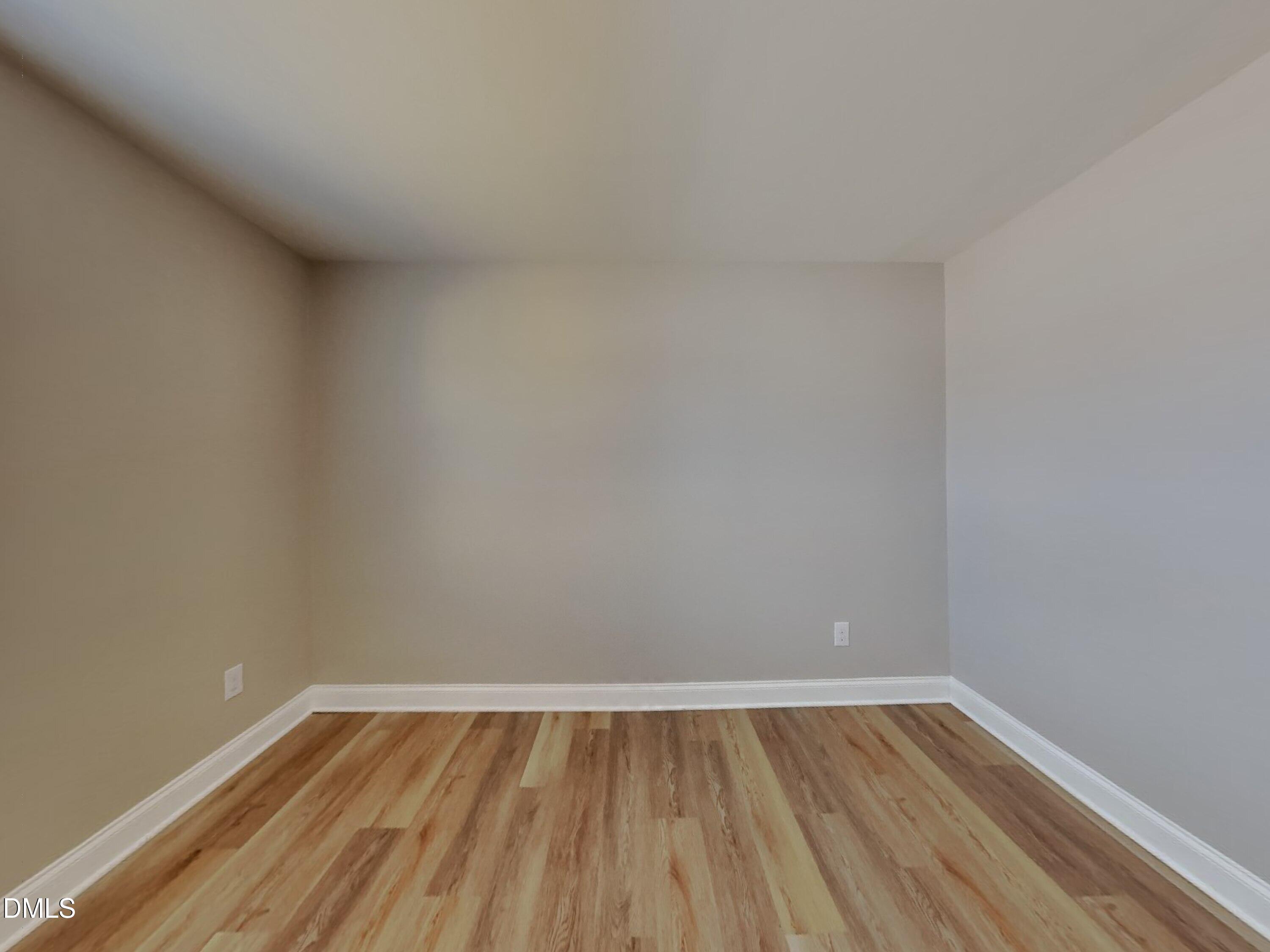 50 Gallery Park Drive Franklinton, NC 27525 - Photo 11 of 18 a view of an empty room and wooden floor