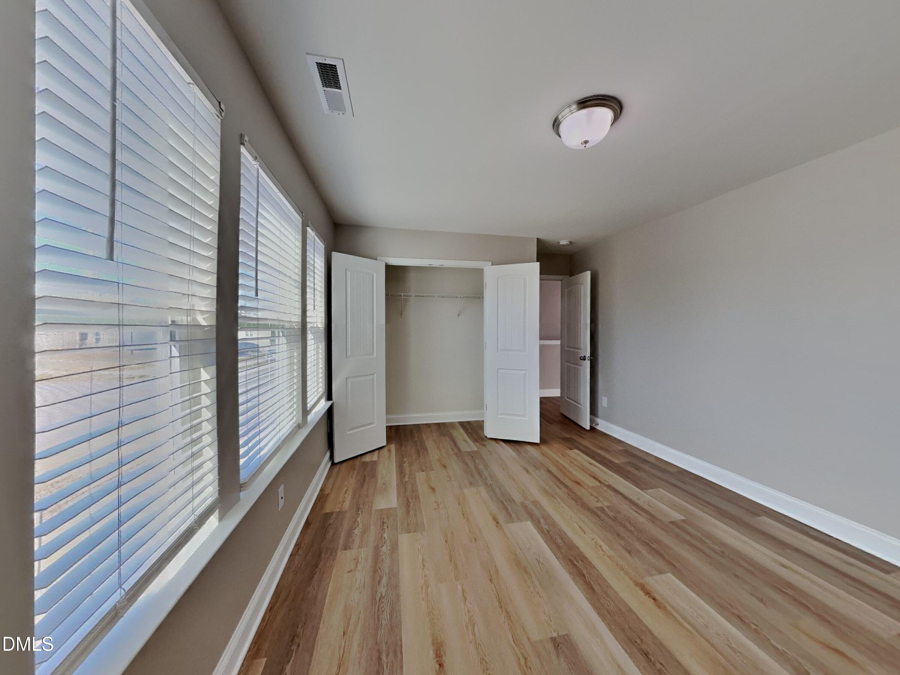 50 Gallery Park Drive Franklinton, NC 27525 - Photo 12 of 18 a view of wooden floor in an empty room