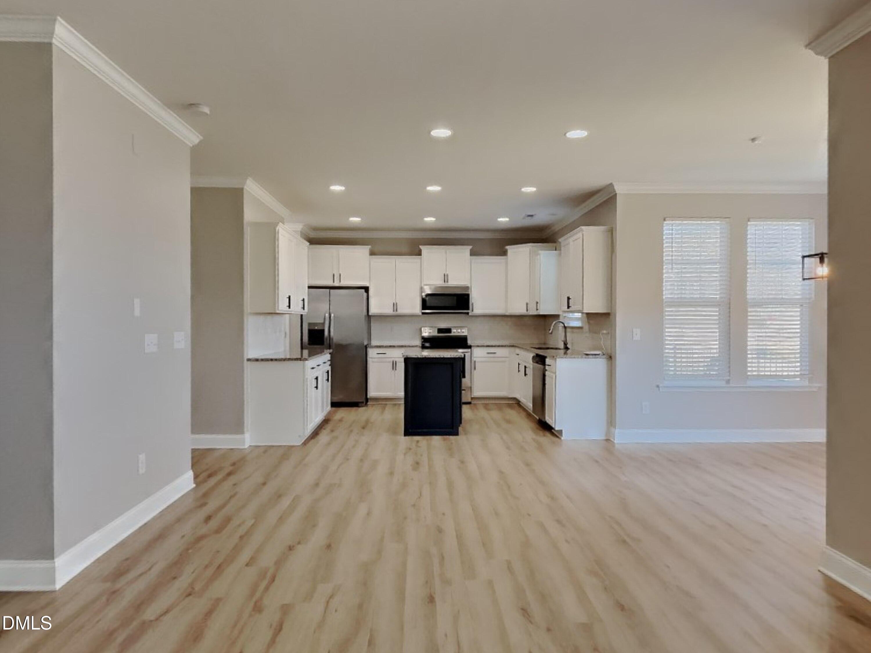50 Gallery Park Drive Franklinton, NC 27525 - Photo 3 of 18 a kitchen with a refrigerator and a microwave